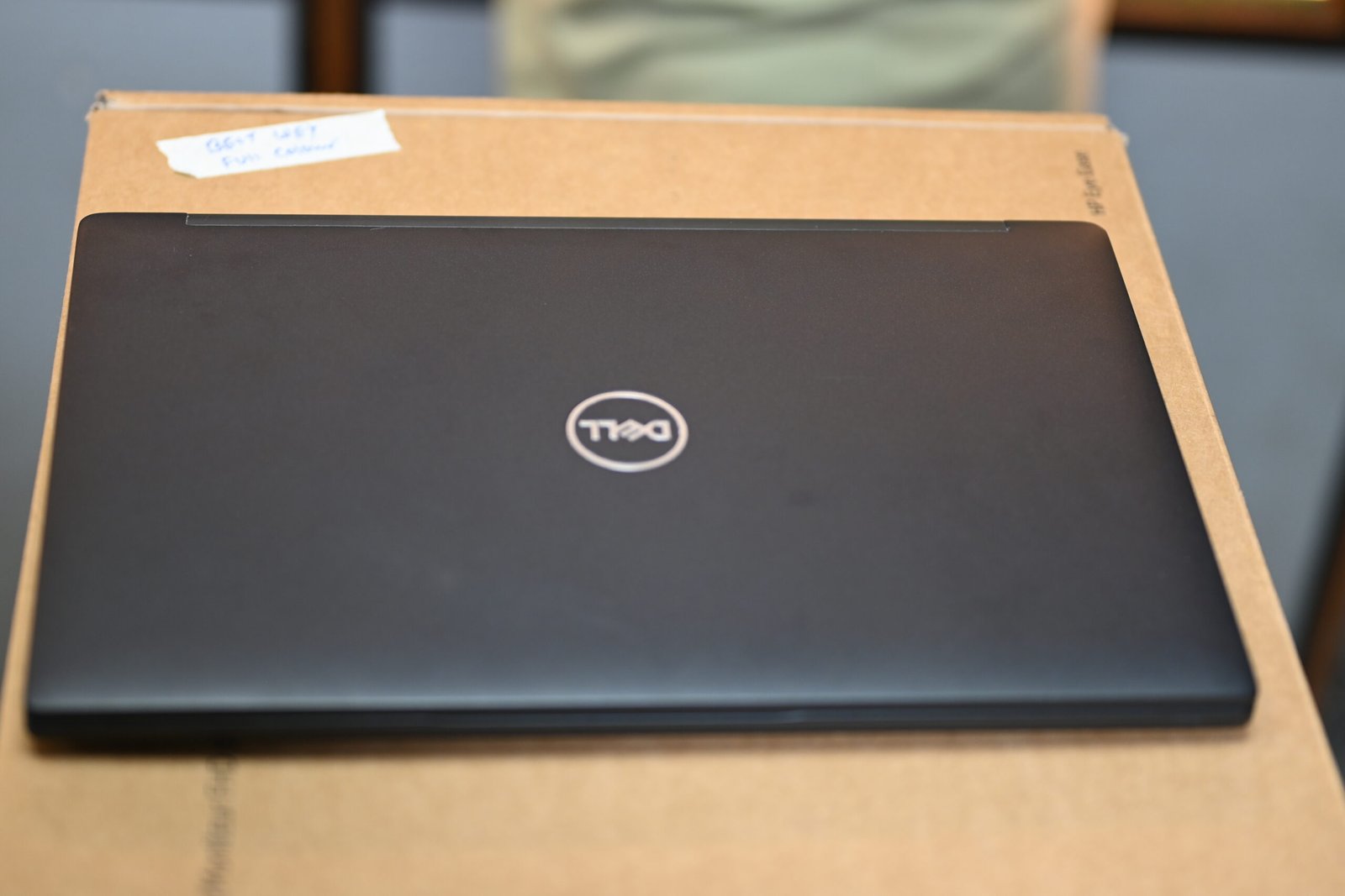 Dell Latitude 7490 side ports including USB, HDMI, and charging ports on a business laptop
